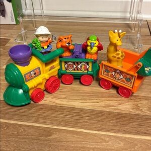Vibrant Toy Train Set with Animal Figure